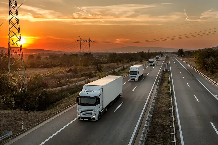 Trucks driving on a road